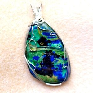 Silver, green, and blue pendant